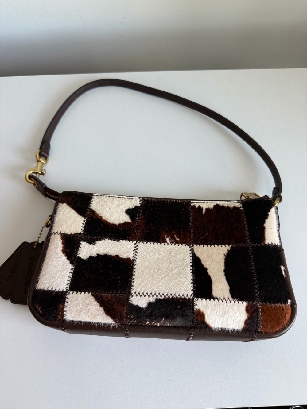 Coach Patchwork Cowhide Wristlet Clutch in Brown and White